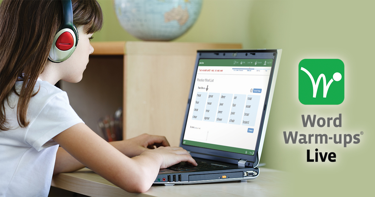 Student on Computer with Headphones